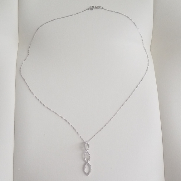 NWOT Silver tone rhinestone infinity loop necklace - Picture 2 of 3